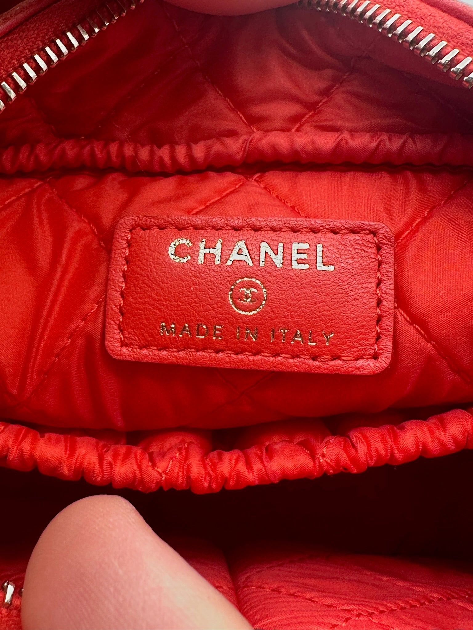 Chanel Pochette Trousse Curvy in pelle di agnello color rosso/corallo