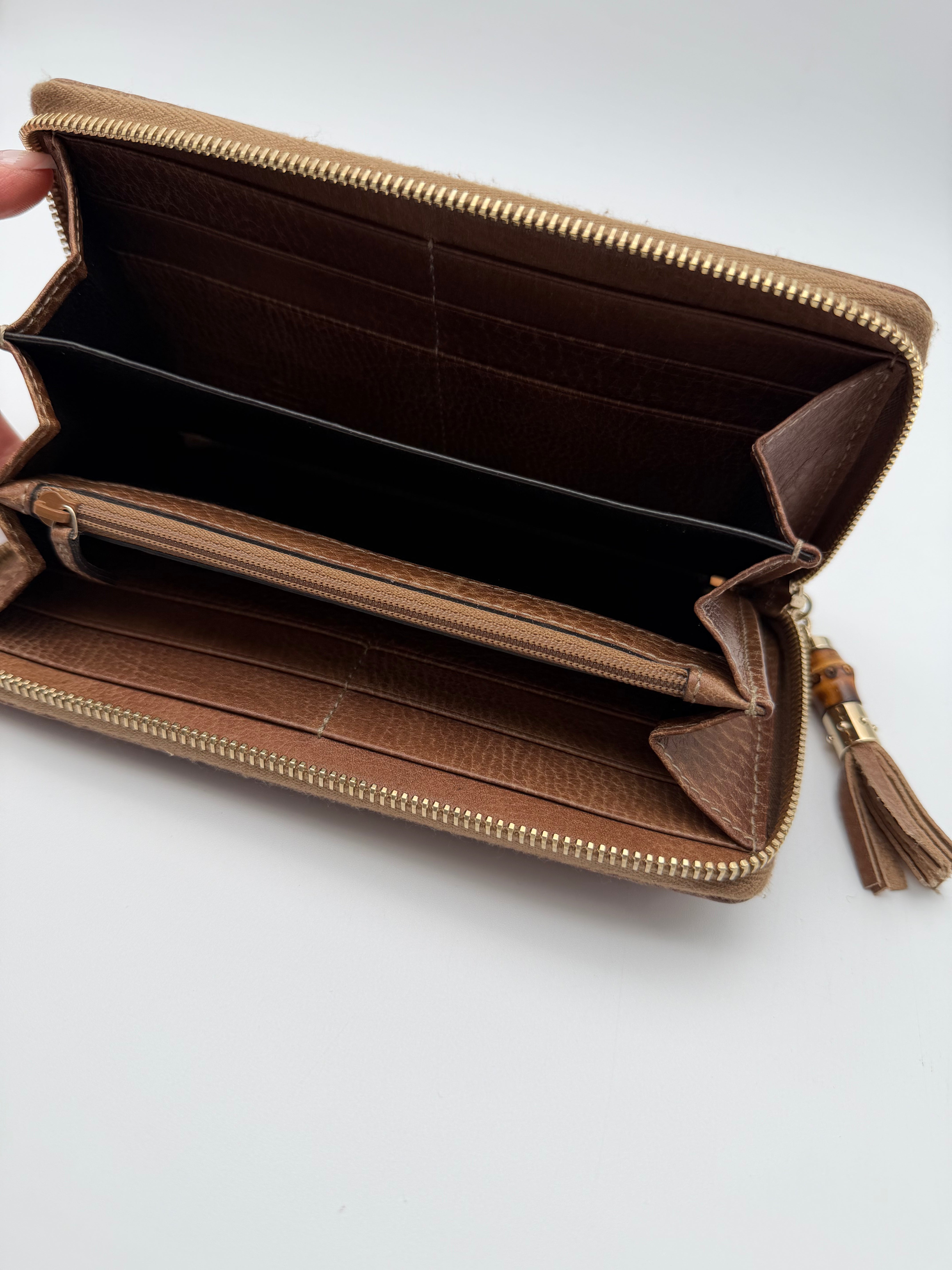 Gucci portafoglio in pelle Guccissima goffrata marrone chiaro e tiravamo in bambù - SGER S.r.l.