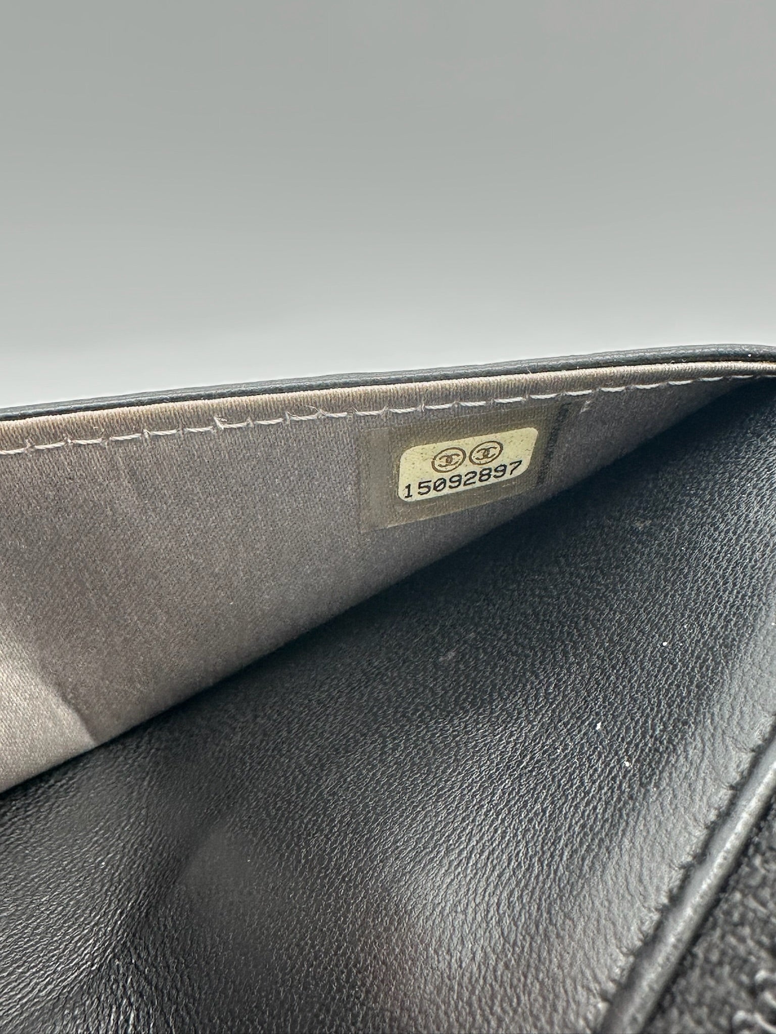 Chanel Camellia Wallet on Chain in black lambskin