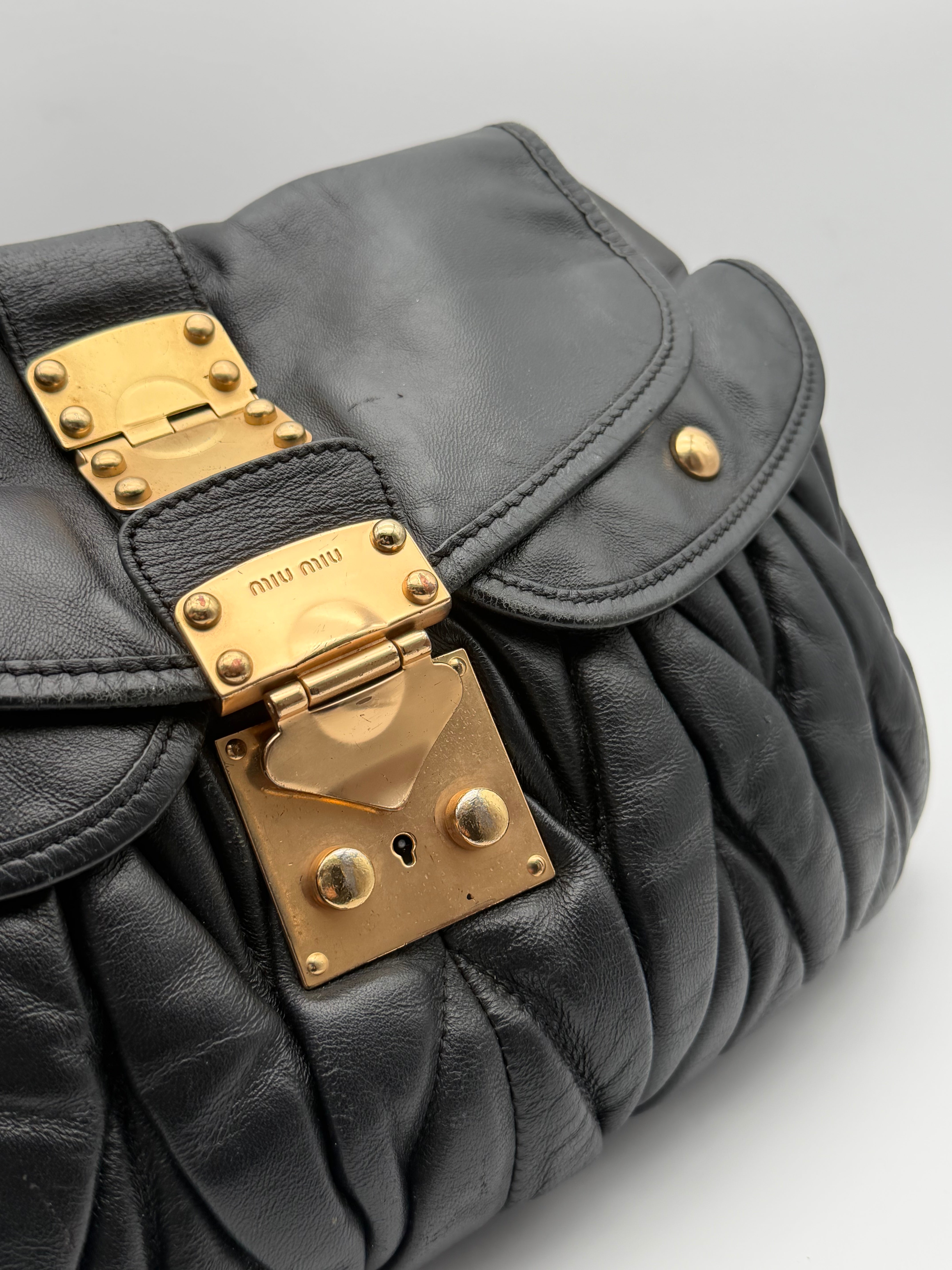 Beautiful Miu Miu Coffer bag in black calfskin