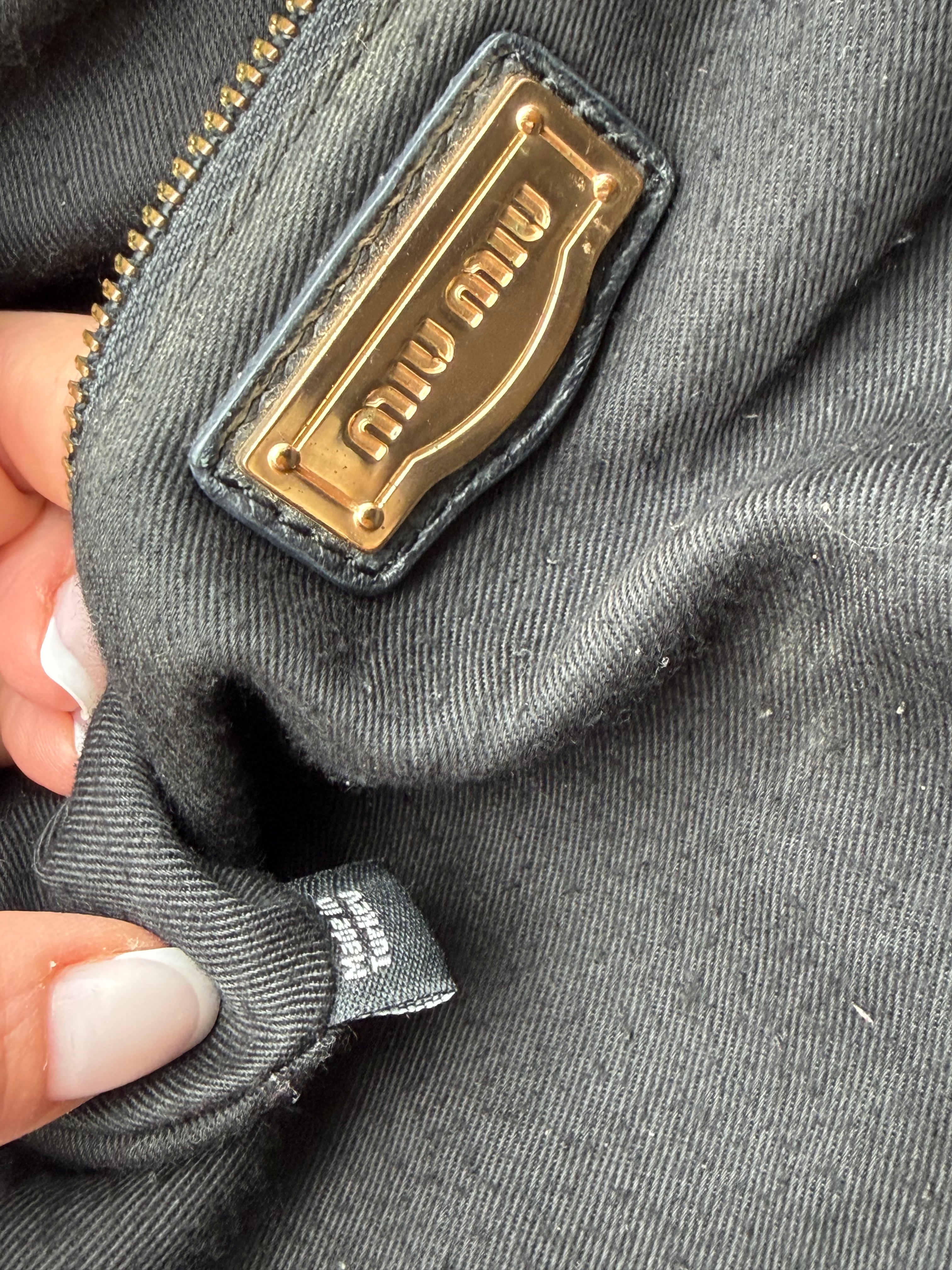 Beautiful Miu Miu Coffer bag in black calfskin
