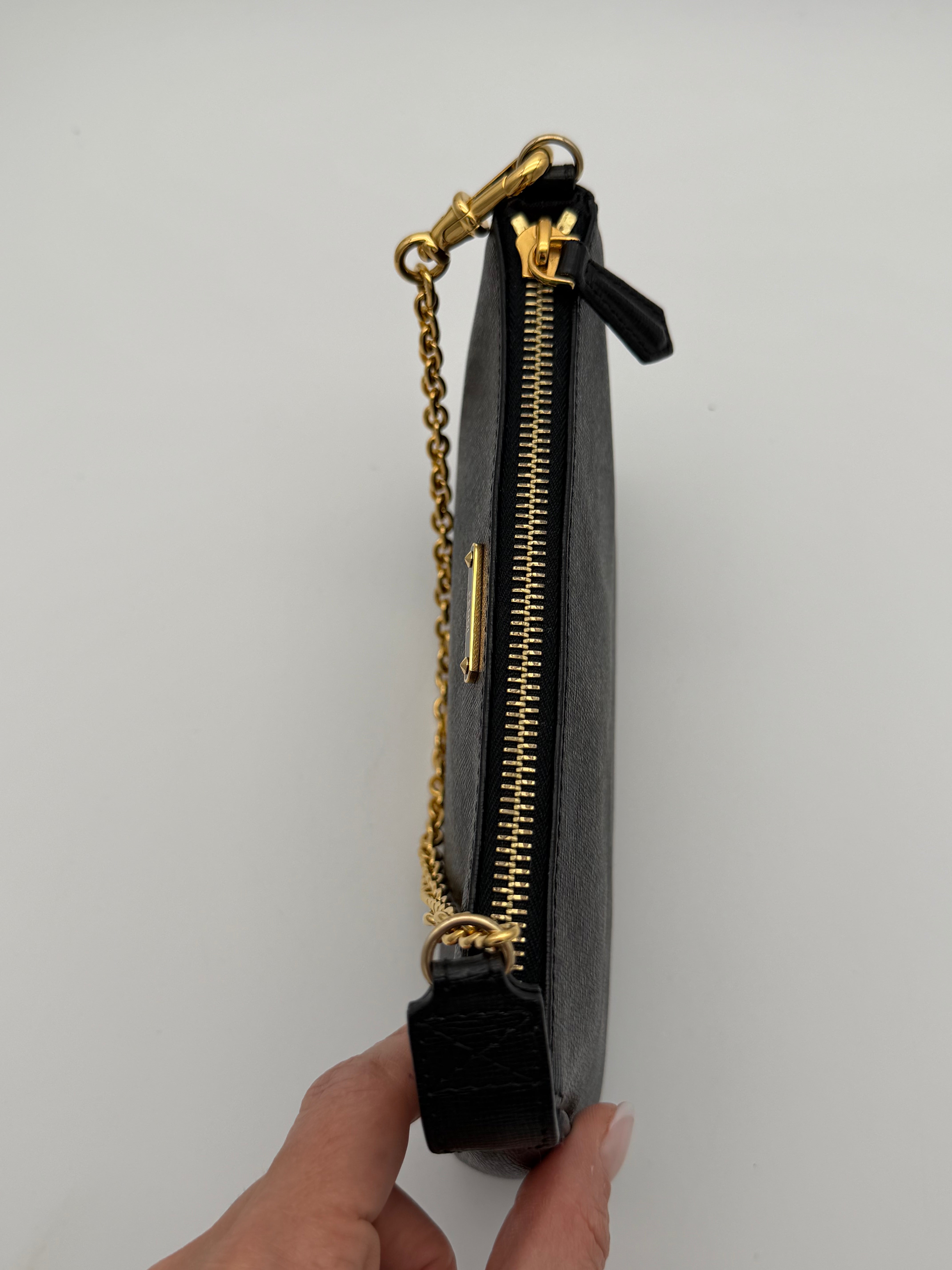 Fendi Elite black calfskin clutch from the 2013/2014 "Crayons" collection