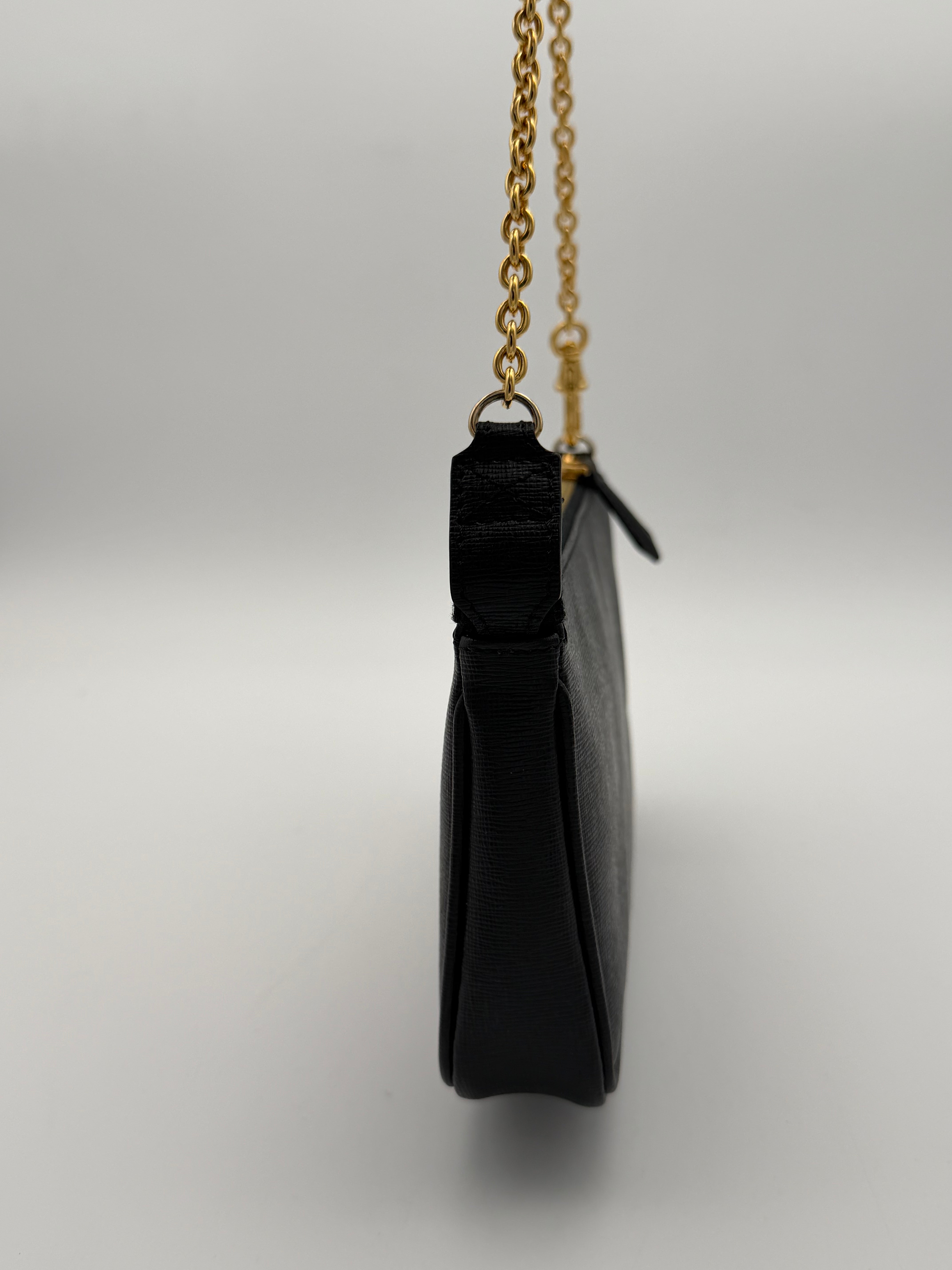 Fendi Elite black calfskin clutch from the 2013/2014 "Crayons" collection