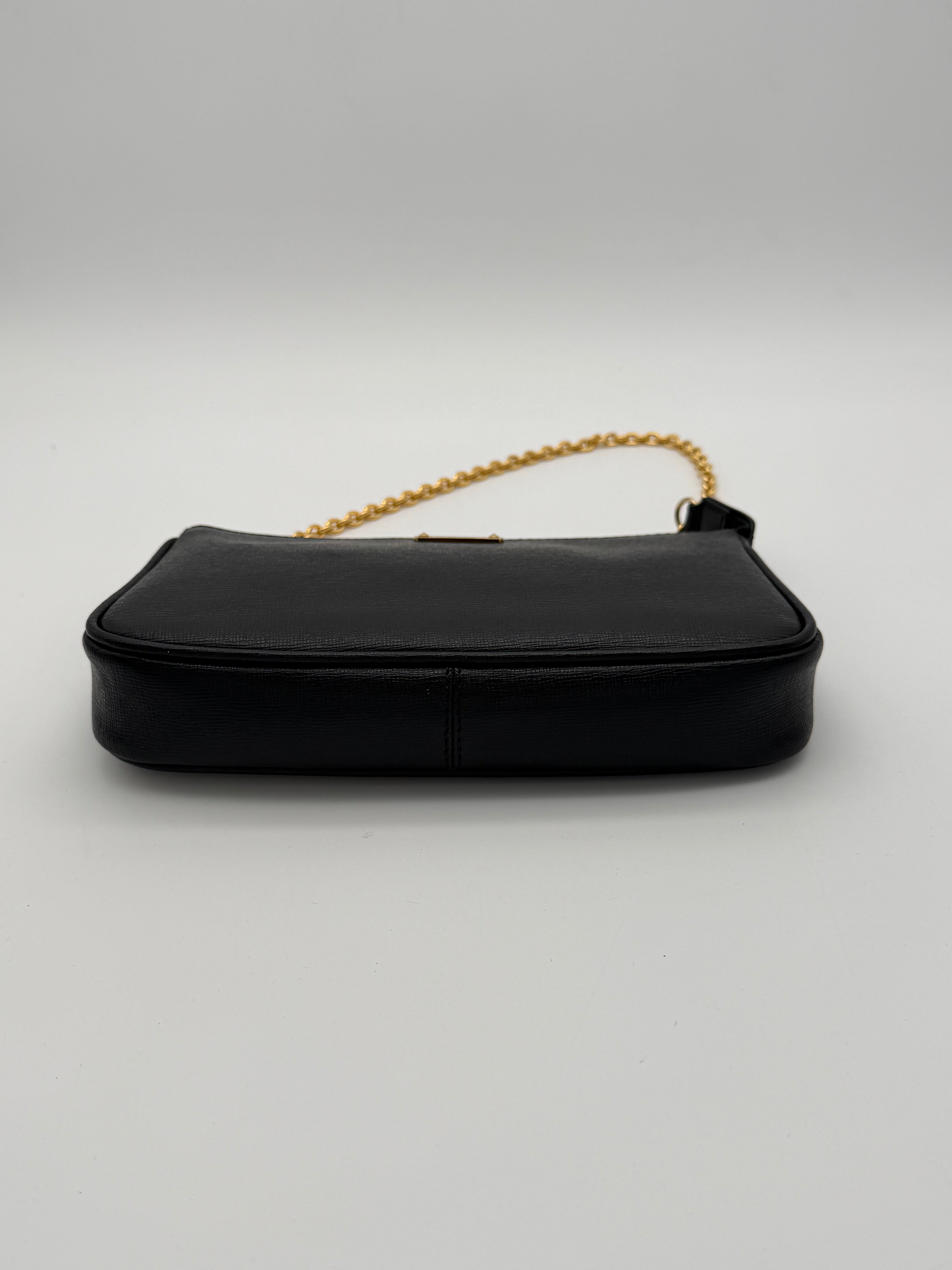 Fendi Elite black calfskin clutch from the 2013/2014 "Crayons" collection