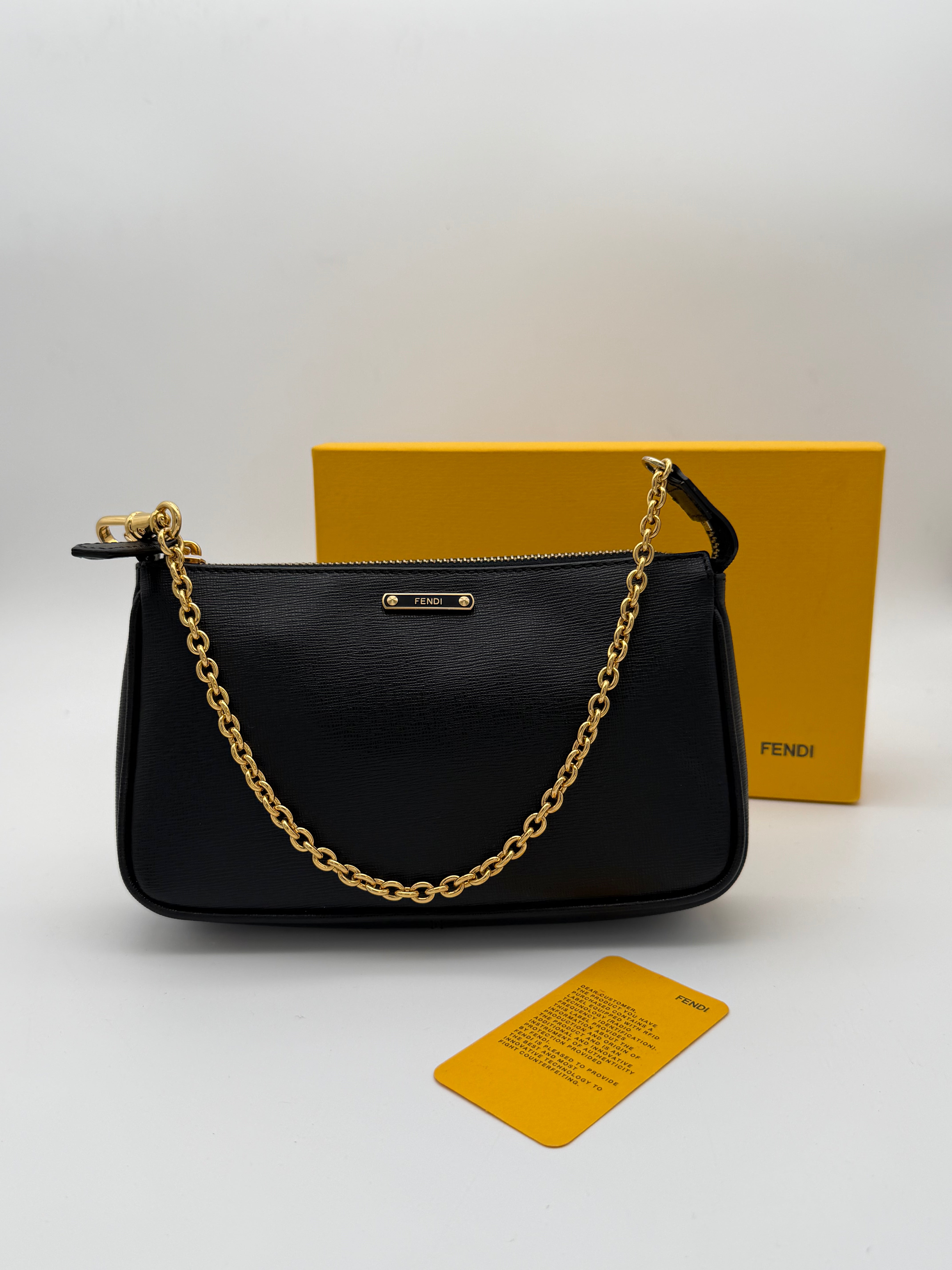 Fendi Elite black calfskin clutch from the 2013/2014 "Crayons" collection