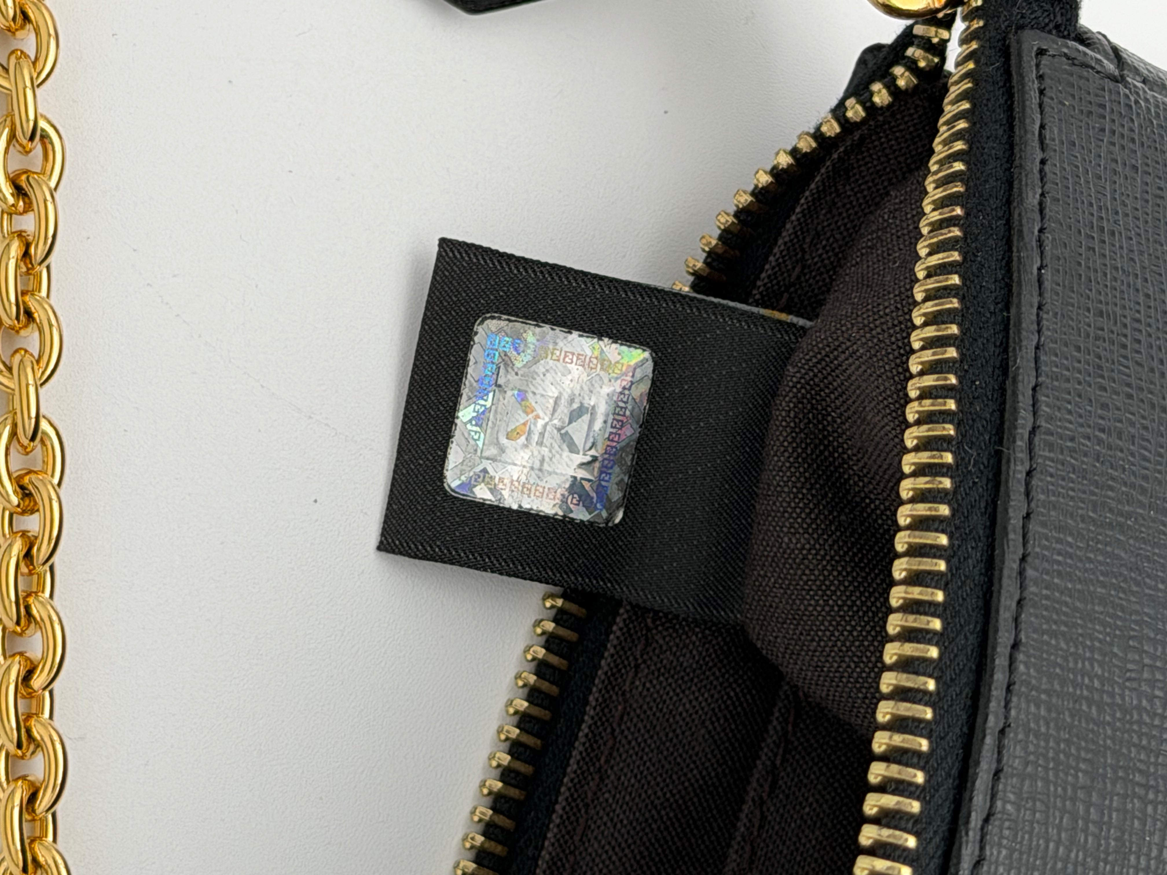 Fendi Elite black calfskin clutch from the 2013/2014 "Crayons" collection