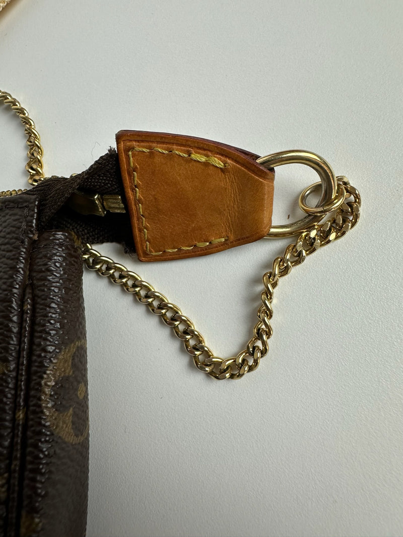 Mini pochette accessoire Louis Vuitton